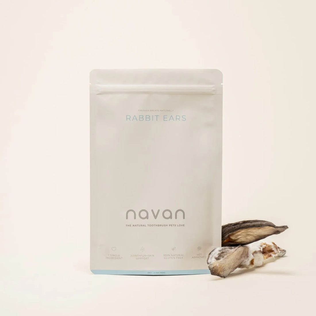 Dog enjoying a Navan Pet chew as part of an oral wellness routine